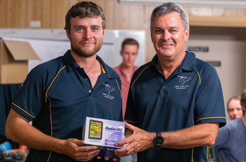 Al Sim presents Reuben Lane with the Oudie IGC donated by GoSoaring